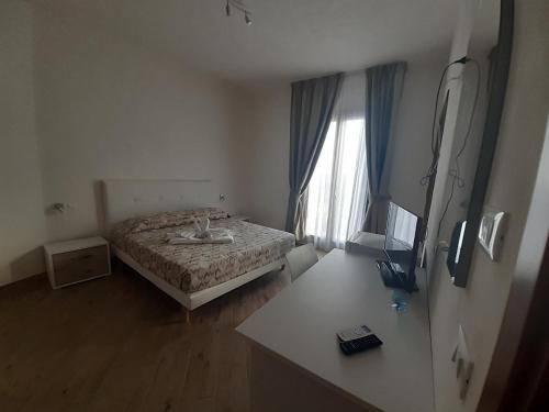Postel nebo postele na pokoji v ubytování A casa di Vito