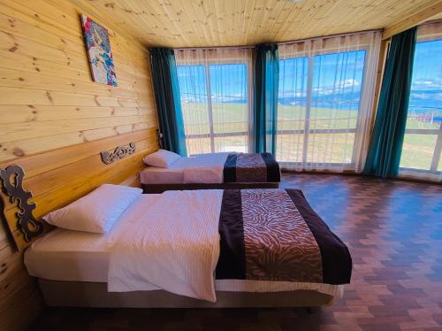 Cama o camas de una habitación en Baikal Terra Hotel