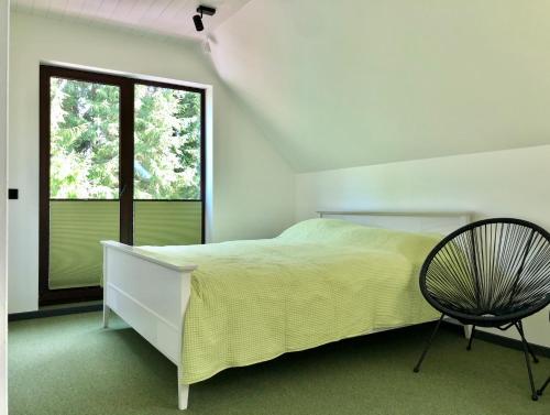 Postel nebo postele na pokoji v ubytování Holstre Paradiis