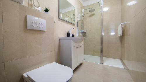Et badeværelse på Rooms & Apartments Toni