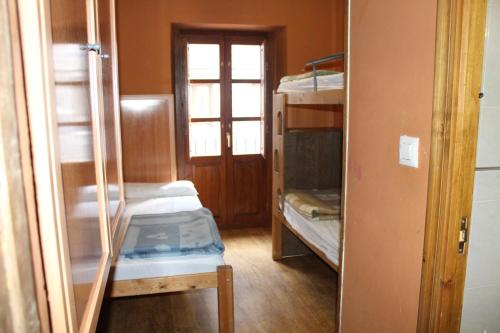 Postel nebo postele na pokoji v ubytování Albergue-Refugio Sargantana