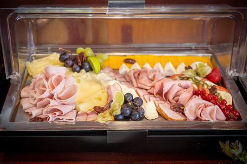 a plastic container filled with different types of food at Wellness Hotel ABÁCIE in Nový Jičín