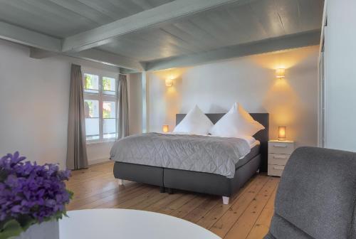 Ένα ή περισσότερα κρεβάτια σε δωμάτιο στο Gutshaus No3