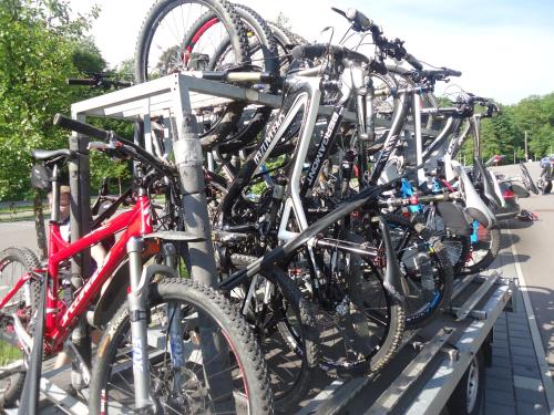 a bunch of bikes parked on a bike rack at Landgasthof Zur Post, Hochwälder Radstation in Kell