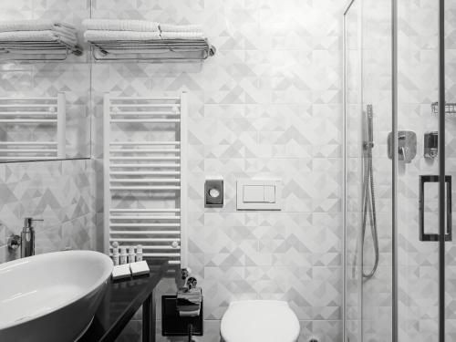 Een badkamer bij EA Hotel Royal Esprit