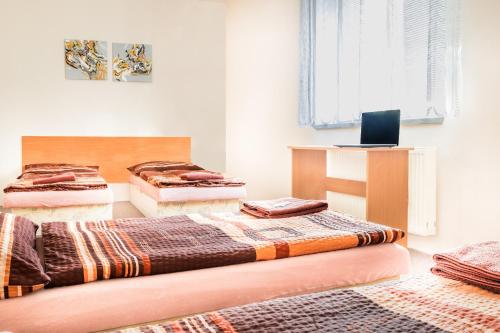 Кровать или кровати в номере Hotel Zannam