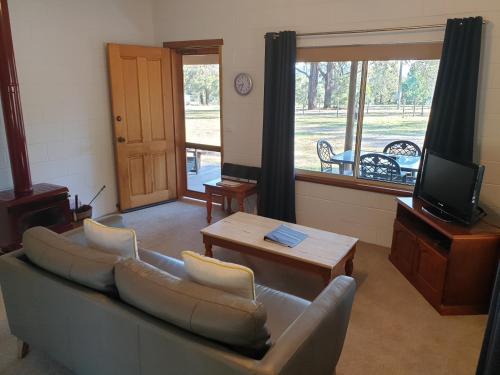 A seating area at Woodlane Cottages Hunter Valley