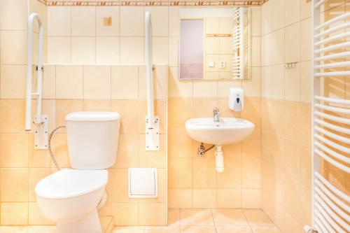 Koupelna v ubytování Hotel Zannam