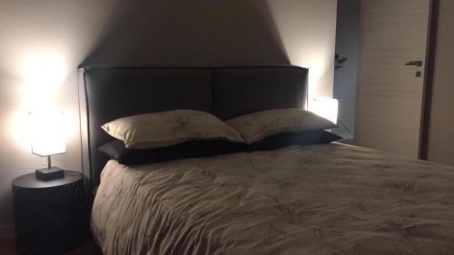 Ein Bett oder Betten in einem Zimmer der Unterkunft Piazza Castello