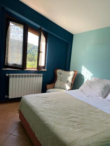 Katil atau katil-katil dalam bilik di La Petite Maison