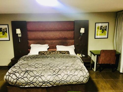 Ένα ή περισσότερα κρεβάτια σε δωμάτιο στο BW Starfire Hotel