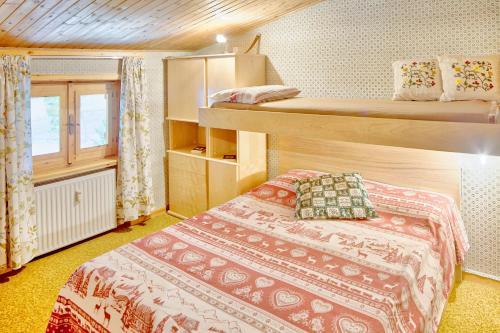 Кровать или кровати в номере The Twins Apartment - Champoluc