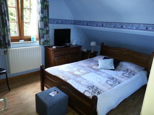 Кровать или кровати в номере Chambre d'hotes du Tailfer