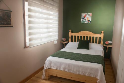 Una cama o camas en una habitación de O SOLPOR