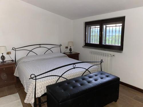 Ein Bett oder Betten in einem Zimmer der Unterkunft B&B Monteguzzo