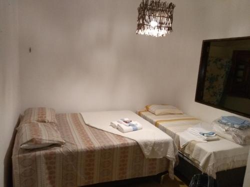 Krevet ili kreveti u jedinici u objektu Casa de Praia em Japaratinga-AL
