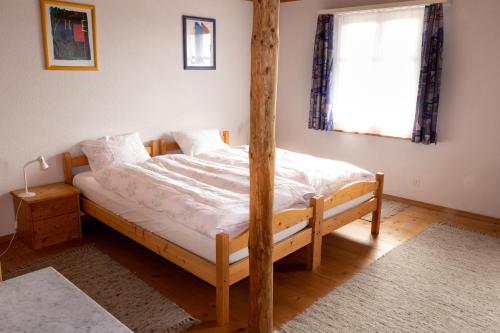 En eller flere senge i et værelse på Gasthaus Freihof
