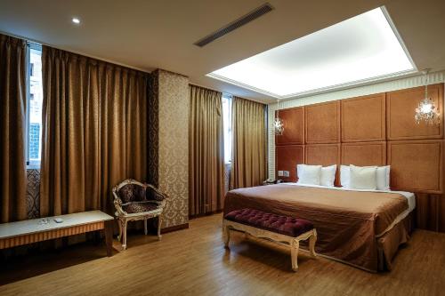 Tempat tidur dalam kamar di Chamotel - Lujhou