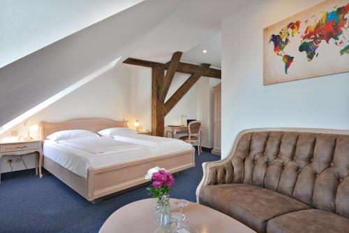 Posteľ alebo postele v izbe v ubytovaní Hotel Stadt Hameln