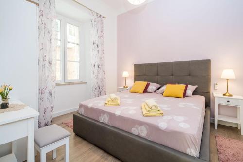 Posteľ alebo postele v izbe v ubytovaní Old Town Top Spot Apartments