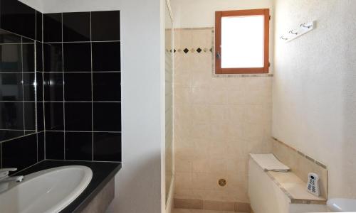 Koupelna v ubytování Locations "ChezChristine" à Aléria