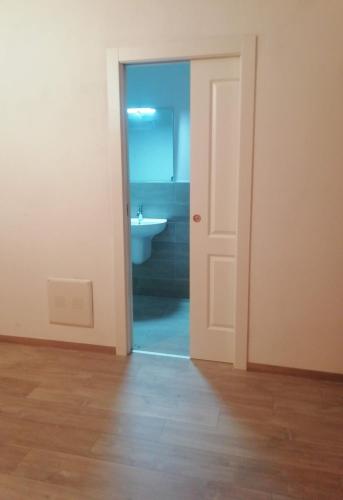 an open door to a bathroom with a sink at Agriturismo La Costa dei Trabocchi in Torino di Sangro