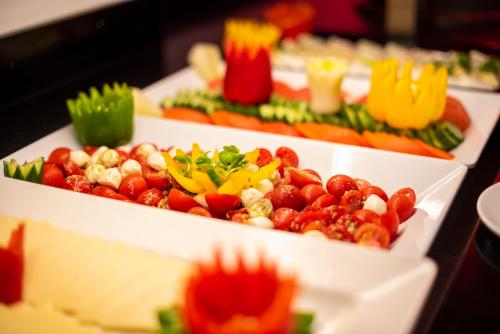 three trays filled with different types of vegetables at White Rock of Kos Hotel - Adults only in Kefalos