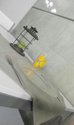 a table with a sink with two eggs on it at Casa dos Avós in Alcácer do Sal