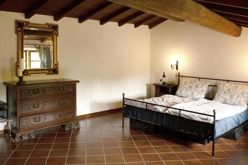 Una cama o camas en una habitación de MULINO VECCHIO