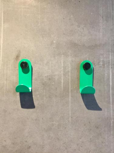 two green speakers sitting on top of a skateboard ramp at Hôtel 16 | 150 Montagne & Spa Nuxe in Vars