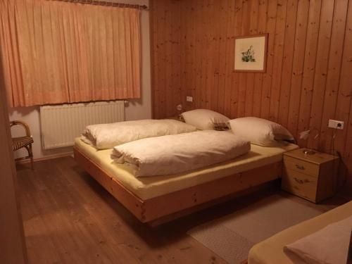 A bed or beds in a room at Pfeifer Birgitt