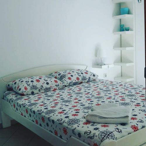 Postel nebo postele na pokoji v ubytování Apartmani Dačo