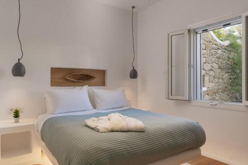 מיטה או מיטות בחדר ב-Villa Ananta Mykonos