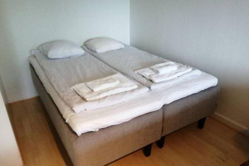 Ένα ή περισσότερα κρεβάτια σε δωμάτιο στο MD Apartments