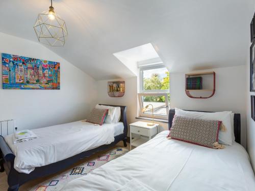 Postel nebo postele na pokoji v ubytování Macs Townhouse Dungarvan