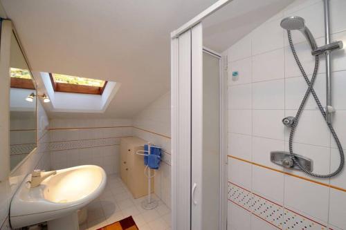 a bathroom with a sink and a shower at Mamma Rosanna 2 - Studio flat in Amalfi with terrace in Amalfi