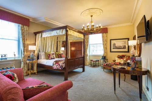 A bed or beds in a room at The Rutland Arms Hotel, Bakewell, Derbyshire