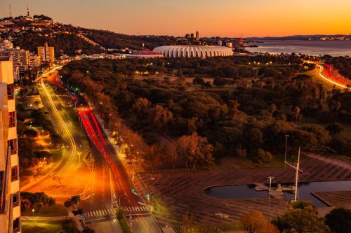 an aerial view of a city at sunset at Blue Tree Towers Millenium Porto Alegre in Porto Alegre