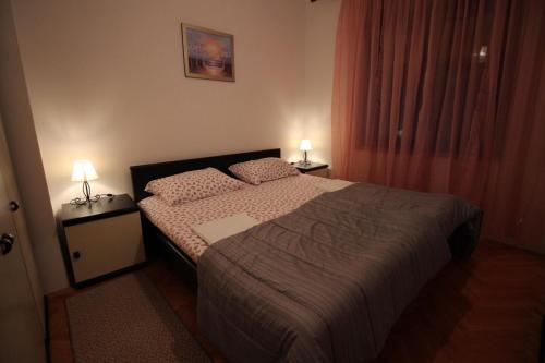 Posteľ alebo postele v izbe v ubytovaní Apartment ZO-NA