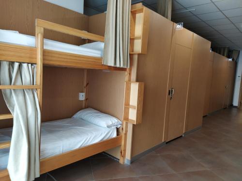 Un ou plusieurs lits superposés dans un hébergement de l'établissement Senda Sur