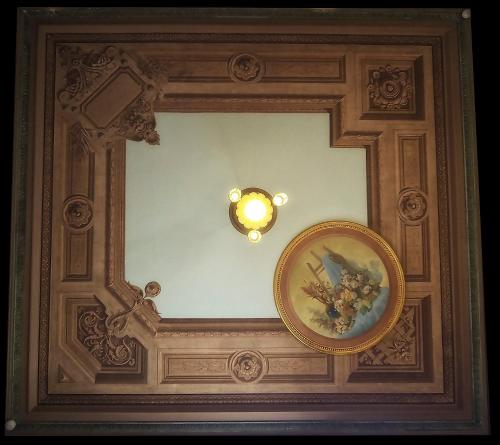 a ceiling with a mirror and a light on it at Chalet Saudade in Sintra