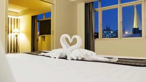 Postel nebo postele na pokoji v ubytování Trang Hotel Bangkok - SHA Plus
