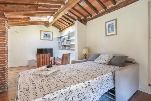 Voodi või voodid majutusasutuse Terrazza San Martino toas