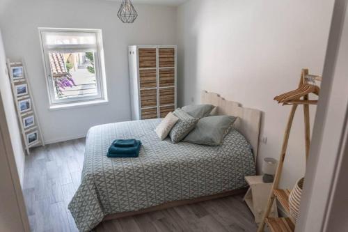 A bed or beds in a room at Casa Ghisa
