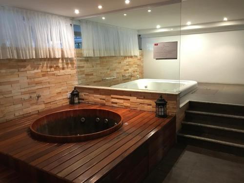 Phòng tắm tại Apartamento Barra Bali Resort
