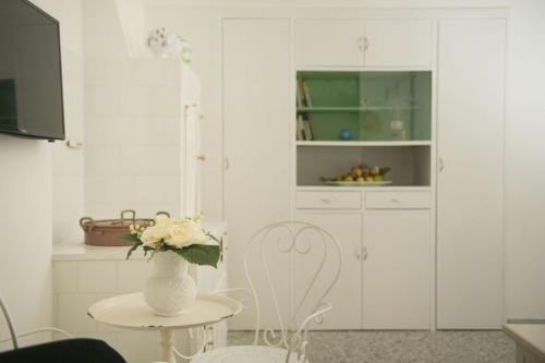 Kuchyň nebo kuchyňský kout v ubytování Dimora Cappuccini Guest House