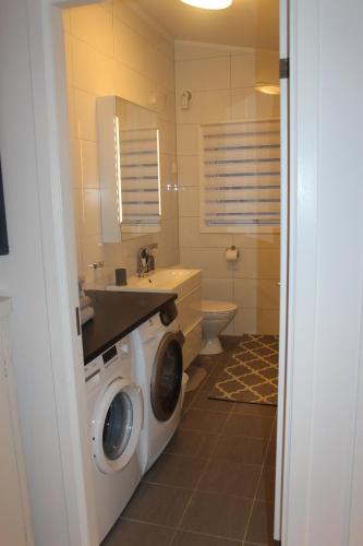 Ett badrum på Superior Citycottage Kristiansand