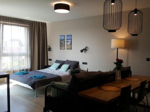 Posteľ alebo postele v izbe v ubytovaní Apartament Bel Mare D 411