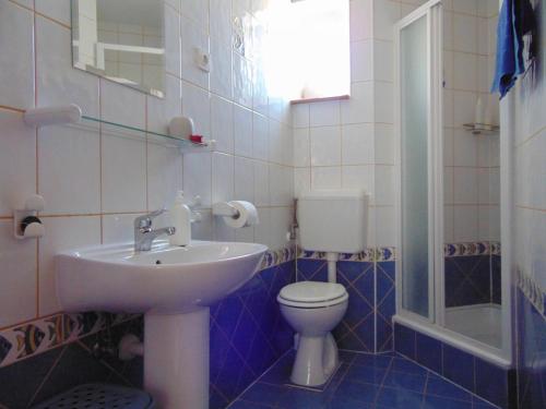 Koupelna v ubytování Apartments Petra