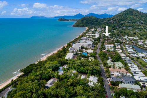 an aerial view of the shoreline of a beach at Cocos Holiday Apartments in Trinity Beach